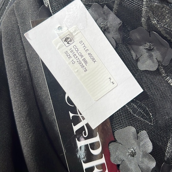 Xscape Puffed-Sleeve Off-The-Shoulder Jumpsuit - Picture 14 of 14